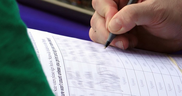 Petition Process Person filling out petition form